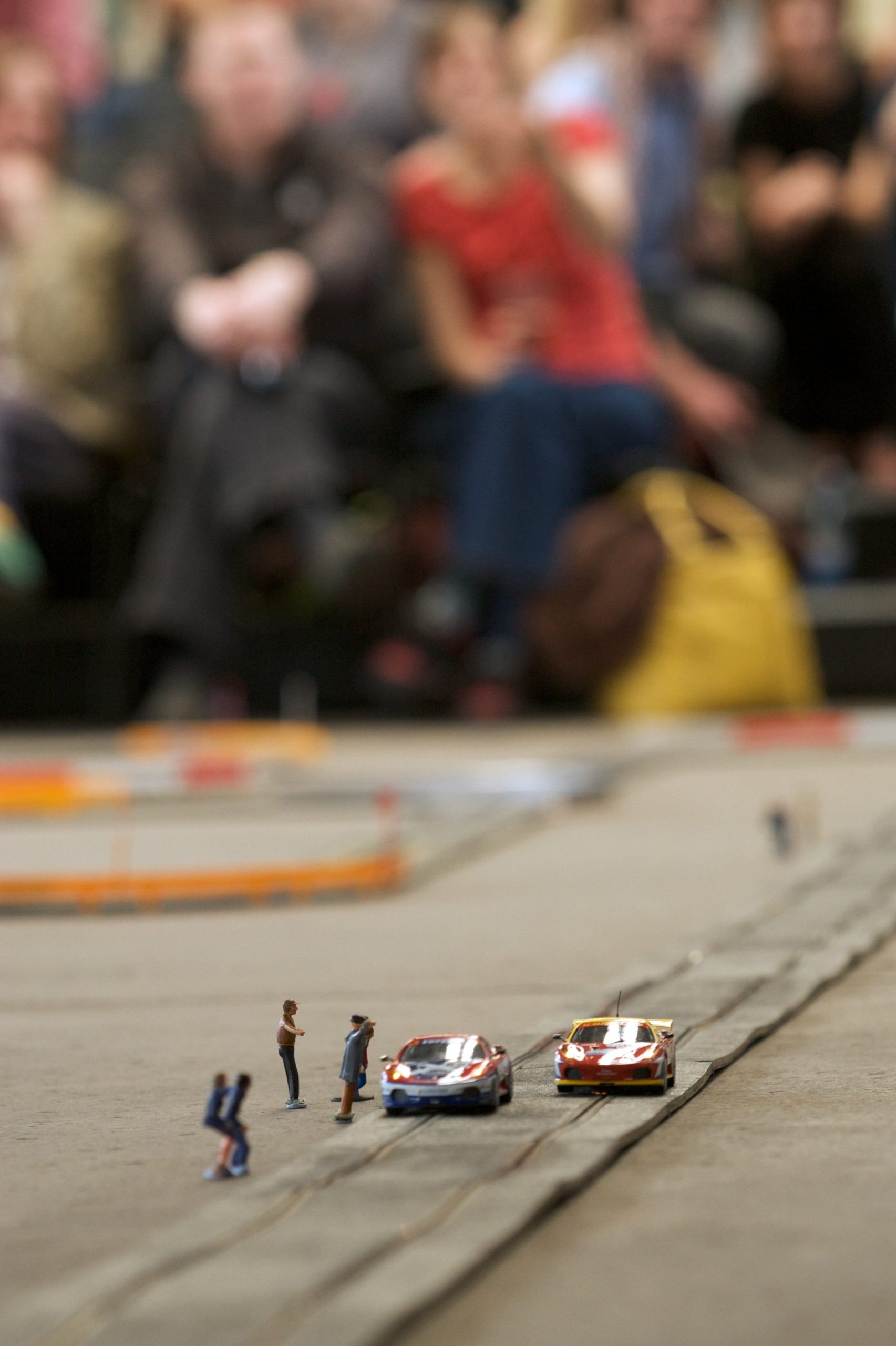 Close up of scalextric cars racing