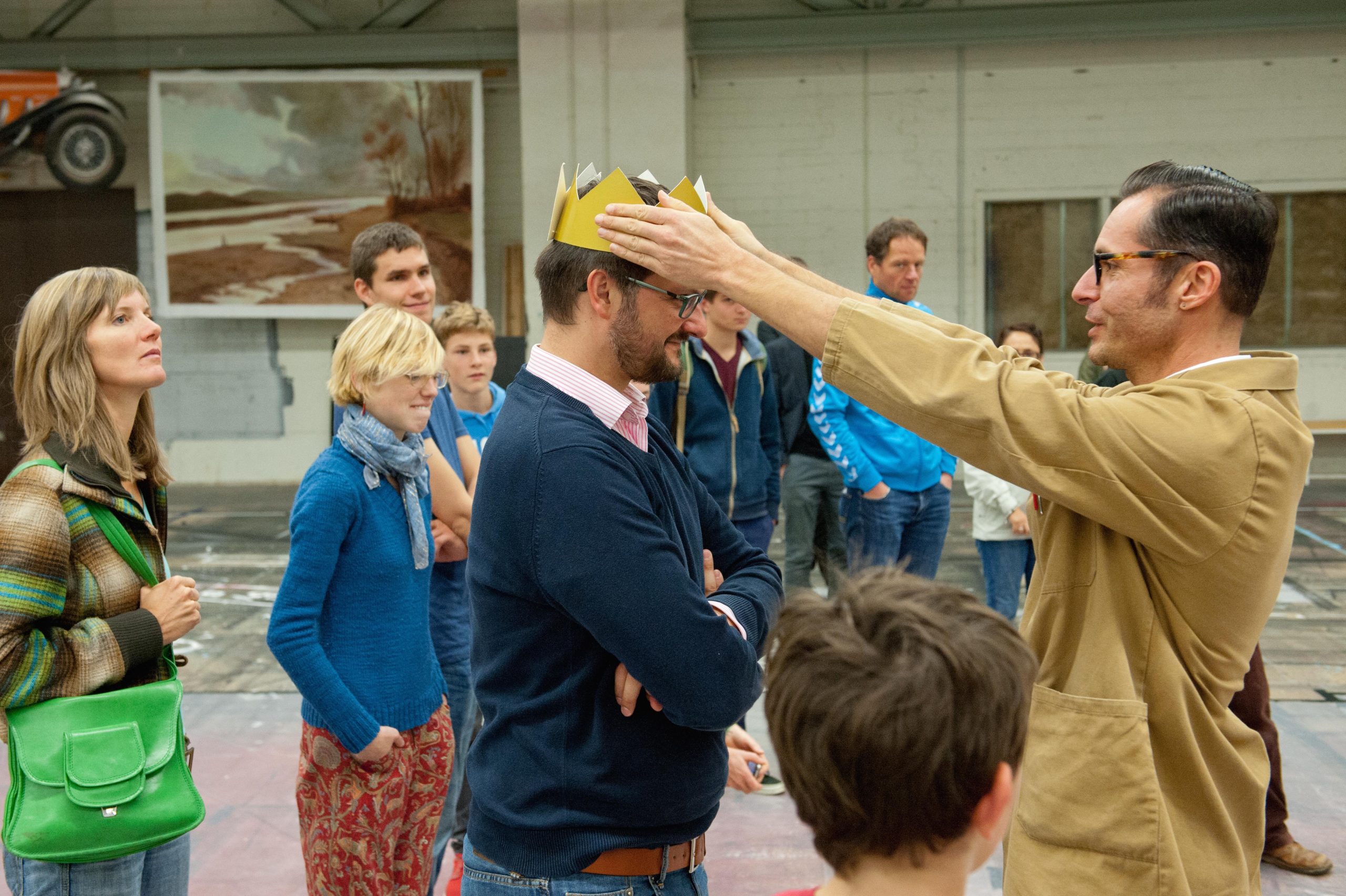 A member of the public is crowned by the Warehouse attendent.