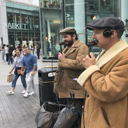 Two Commentators outside Bullring shopping centre.