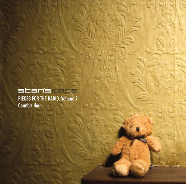 Album cover: A small teddybear leans against olive coloured floral textured wallpaper.